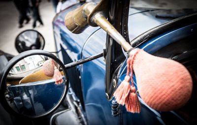 Close-up of man with reflection on mirror