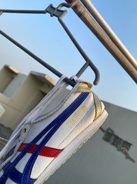 Low angle view of pole against the sky