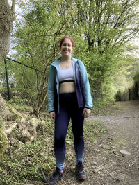 Portrait of teenage girl standing on land