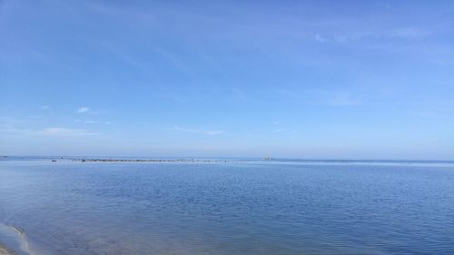 View of calm blue sea against the sky