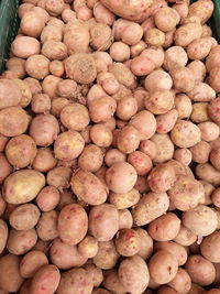 Full frame shot of onions for sale at market stall