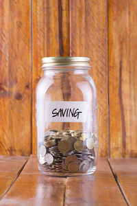 Close-up of glass jar on table