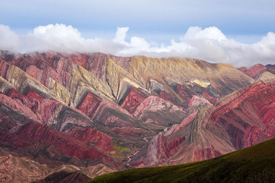 Aerial view of landscape with mountain range in background