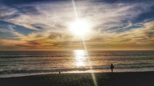 Scenic view of sea at sunset