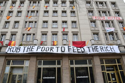 Low angle view of text on building