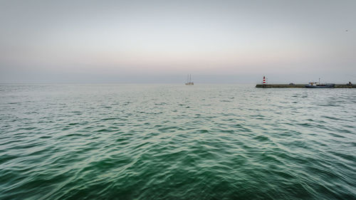 Scenic view of sea against clear sky