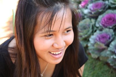 Close-up portrait of smiling woman