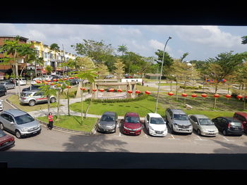 Cars on road against sky