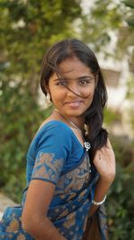 Portrait of a smiling young woman