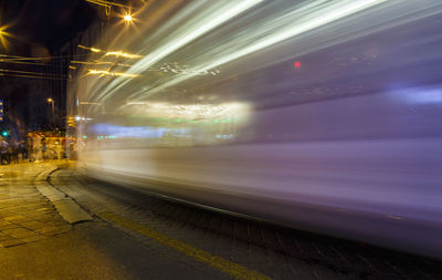 Blurred motion of cable car at night