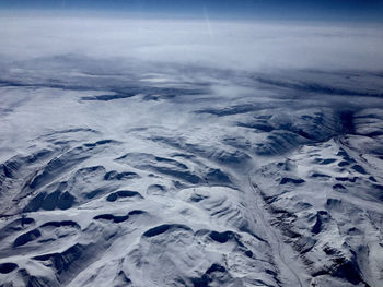 Scenic view of snow covered landscape