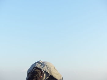 Close-up of man against clear sky