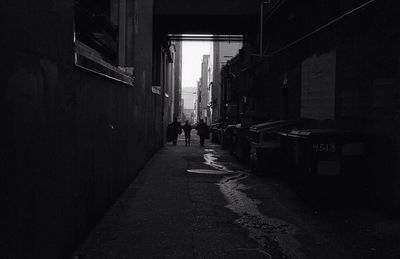 Narrow alley along buildings