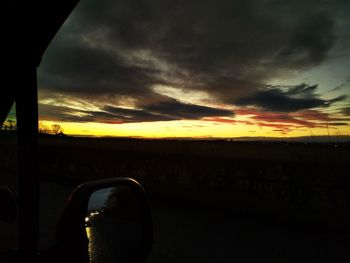 Scenic view of dramatic sky during sunset