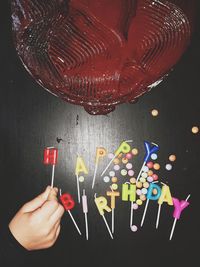 High angle view of hand holding text