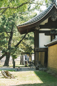 Gazebo in park against building