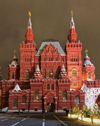 View of illuminated building against sky at night