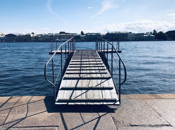 View of pier on sea against sky