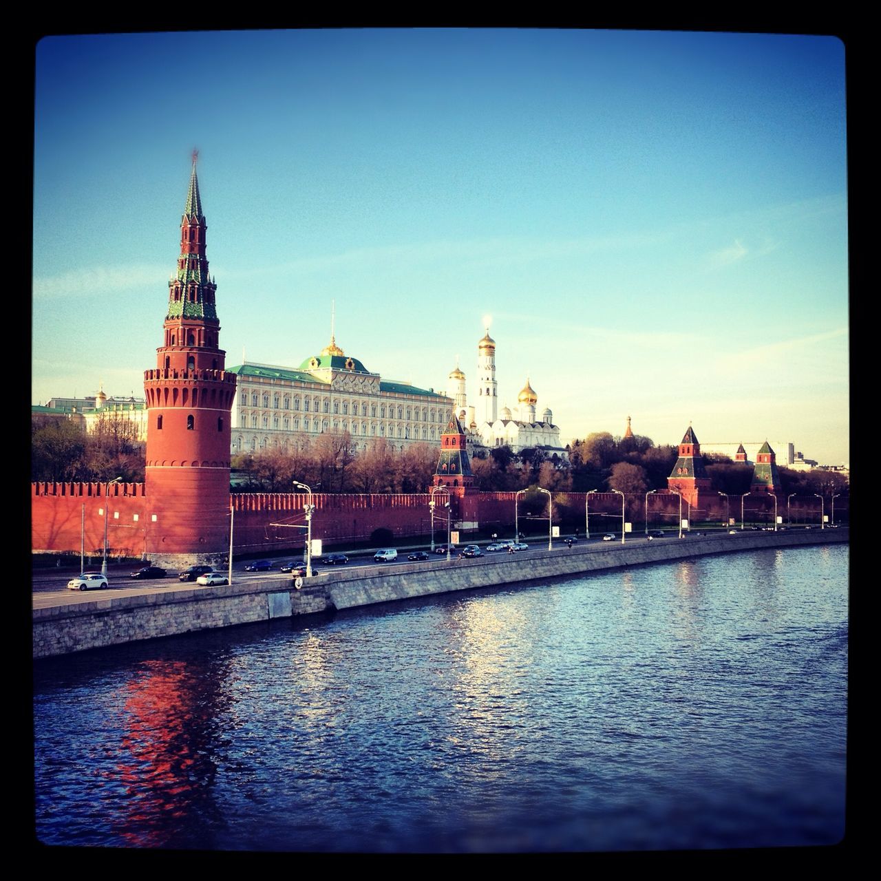 building exterior, architecture, built structure, transfer print, water, auto post production filter, waterfront, river, city, church, sky, place of worship, religion, travel destinations, cathedral, spirituality, famous place, reflection, blue