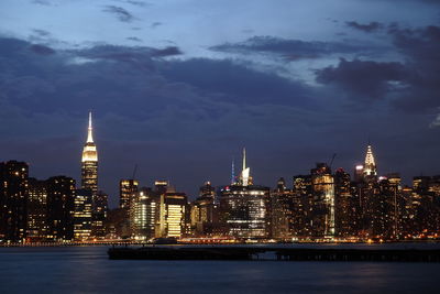 Illuminated buildings in city at night