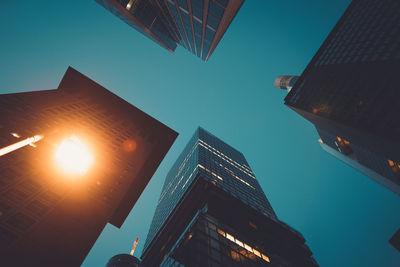 Low angle view of illuminated street light