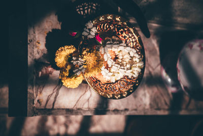 Close-up of human hand holding ice cream cone