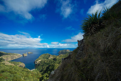 Scenic view of sea against cloudy sky