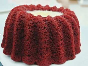 Close-up of red cake on table