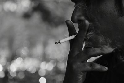 Close-up of man smoking cigarette