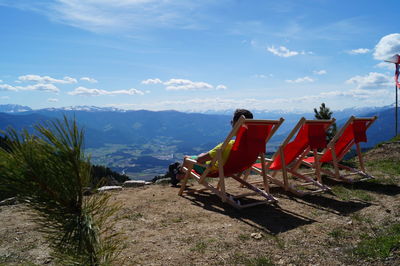 Scenic view of landscape against cloudy sky