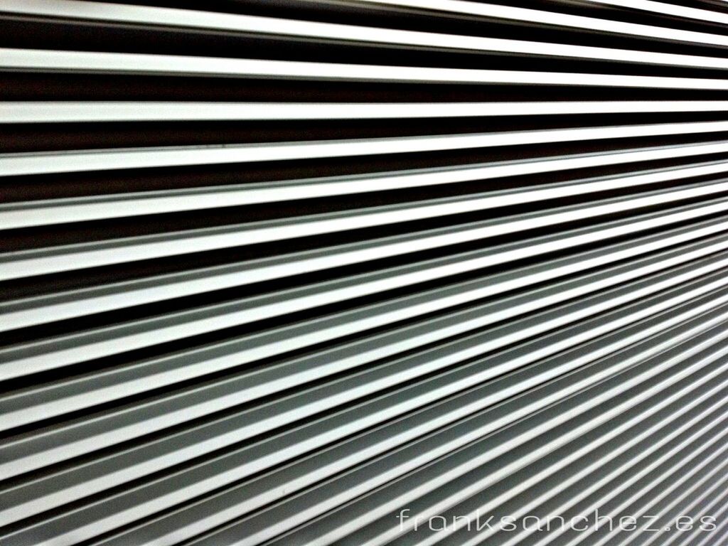 full frame, backgrounds, pattern, repetition, in a row, design, textured, indoors, architecture, built structure, no people, close-up, wall - building feature, abstract, side by side, striped, low angle view, day, detail, order