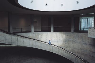 Woman walking on staircase