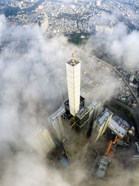 High angle view of communications tower in city