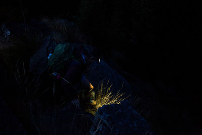 High angle view of illuminated rocks at night