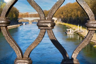 Close-up of old bridge over river