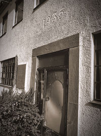 Low angle view of window of old building