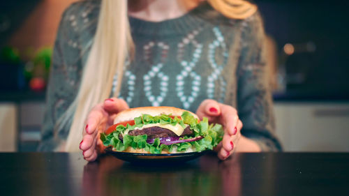 Midsection of person preparing food