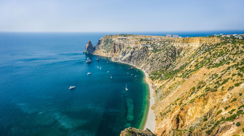 High angle view of sea shore against sky