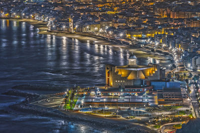 High angle view of illuminated city at night