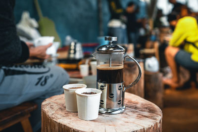 Close-up of coffee cup on table at cafe