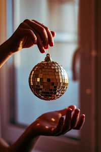 Close-up of woman holding hand