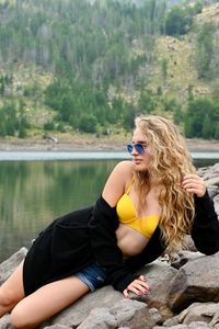 Woman sitting in a lake