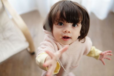 Portrait of cute baby at home