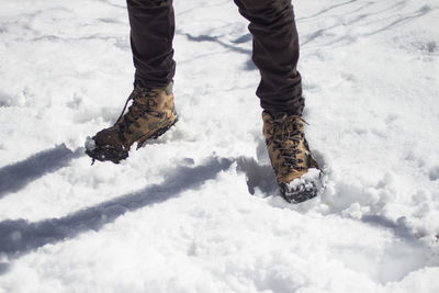 Low section of man on snow