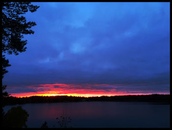 Scenic view of landscape against cloudy sky