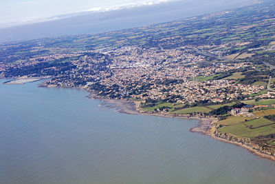 Aerial view of river amidst landscape against sky