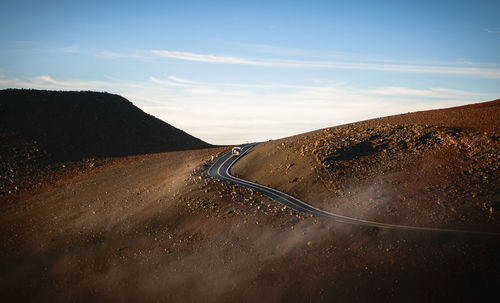 Road on mountain against sky