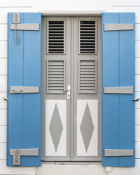 Closed blue door of building