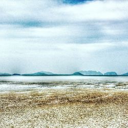 Scenic view of beach against sky