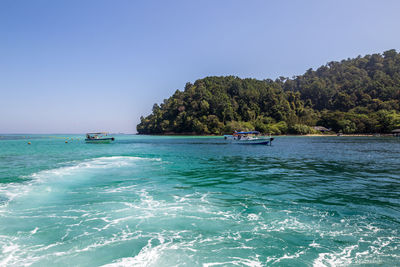 Scenic view of sea against clear sky